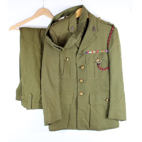 1141 - WW2 RAOC officers uniform with Sam Brown complete with RAOC collar badges buttons and WW2 medal bar.