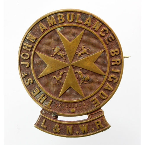 1696 - London & North Western Railway St. John Ambulance Brigade bronze badge (pin fitting).   