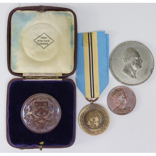 1709 - Medals (4): A university sports medal by John Pinches, 19th/20thC, bronze d.44mm, proof-like AE case... 