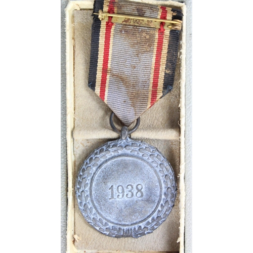 703 - German Nazi Luftschutz medal in box of issue