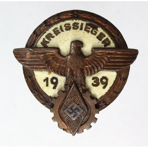 811 - German WW2 scarce 1939 Hitler youth Kreiss Leger badge with award document.