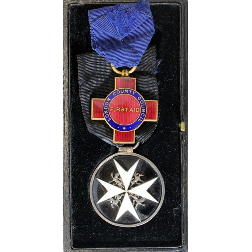 945 - Order of St John medal in case with London County Council First Aid medal named to Teresa Bird.