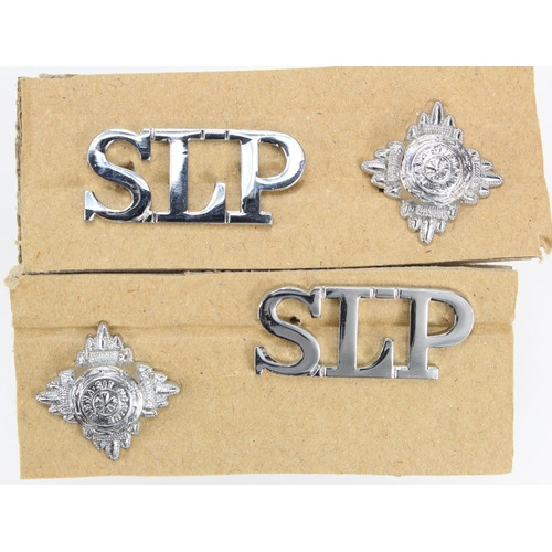 954 - Police badges a pair of Sierra Leonne shoulder titles and officers pips