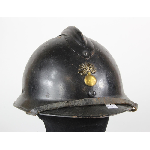 1400 - France a WW2 Adriene Helmet with a likely contemporary black paint finish