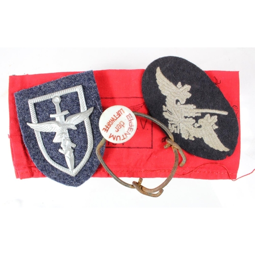 1476 - German Luftwaffe armband, Flak badge and unusual shield badge, plus a Luftwaffe marked bottle top