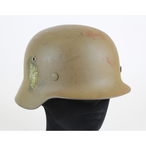 1497 - German Nazi 1935 pattern helmet reissued to the Norwegian Army after WW2 complete with lining.