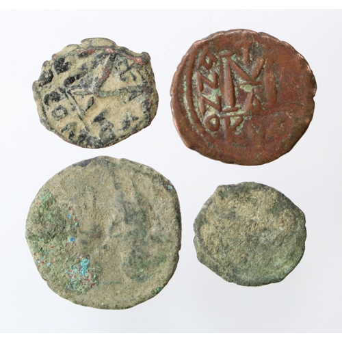 585 - Byzantine Bronze Coins (4) various small to large denominations, unidentified.