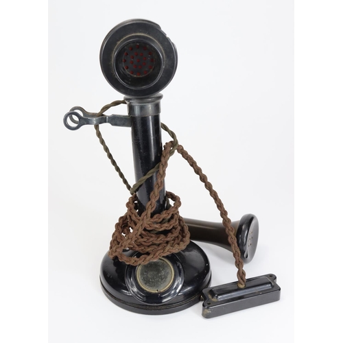 1004 - Telephone. An early candlestick phone in original condition.