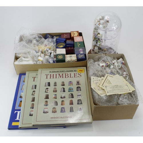 1006 - Thimbles  a large unsorted collection, loose in boxes with a special display case.  (Qty)  Buyer co... 