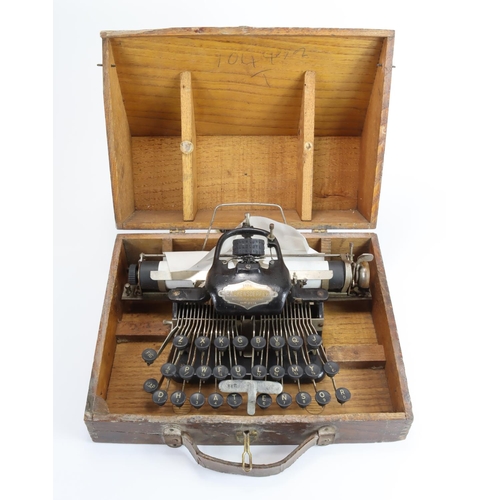 1018 - Typewriter. A Blickensderfer No.5 American featherweight typerwriter in wooden box.