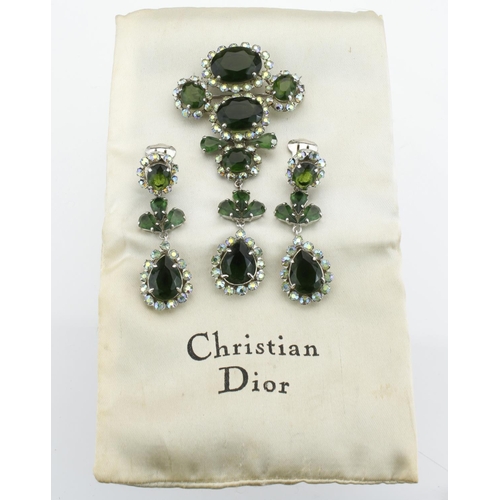 159 - White metal Christian Dior costume brooch set with clusters of green paste stones surrounded by auro... 