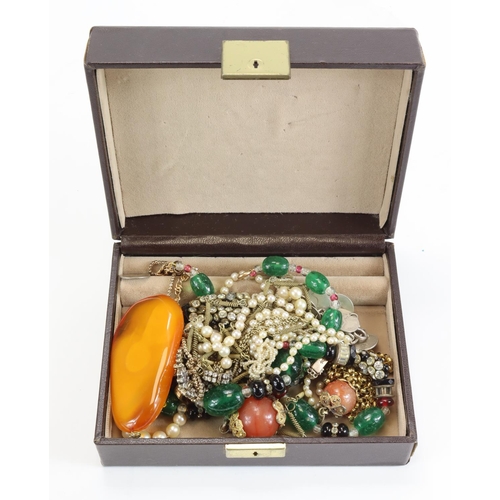 164 - Small jewellery box containing a mixture of gold & yellow metal chains, silver, Amber etc.