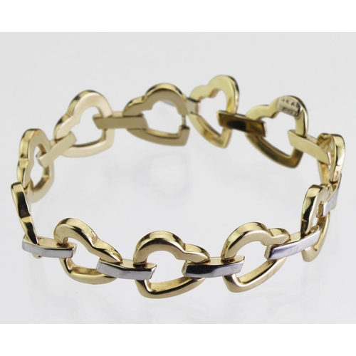 204 - 14ct yellow and white gold hollow bracelet with yellow gold heatr links connected by white gold bar ... 