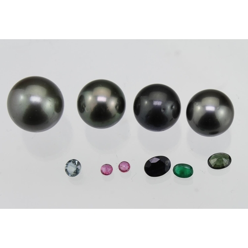 216 - Mixed loose gemstones to include Tahitian pearls, pink sapphire, emerald, green and blue sapphire