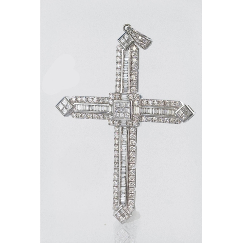 219 - 18ct white gold diamond set cross pendant measuring approx. 8cm x 5.3cm, comprising princess cut, ba... 