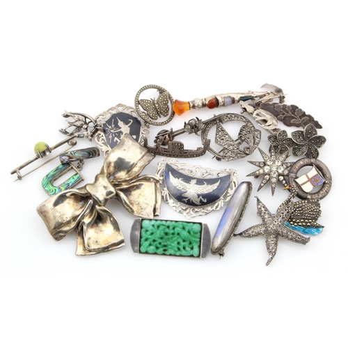 231 - Brooches. A collection of approximately twenty mostly silver brooches (some white metal)