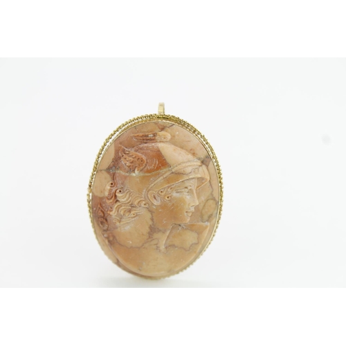 232 - Lava brooch depicting a female set in an 18ct gold frame. Approx 55mm x 40mm