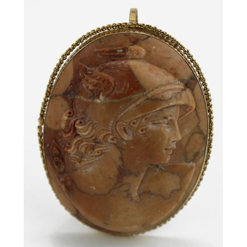 232 - Lava brooch depicting a female set in an 18ct gold frame. Approx 55mm x 40mm