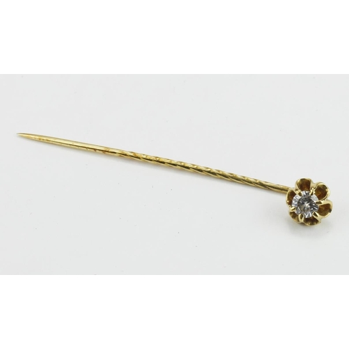 234 - Stick pin approx 18ct gold with a 0.2ct diamond.