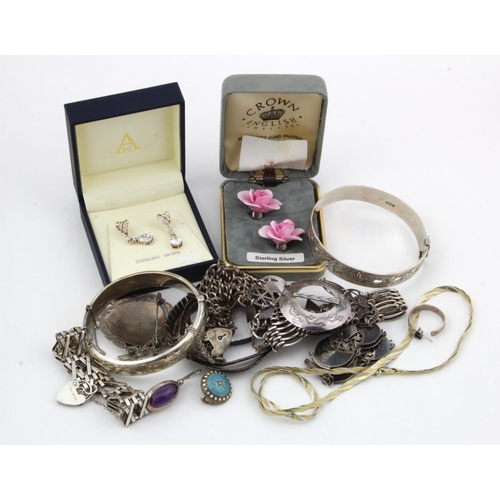 240 - Silver & White Metal Jewellery. A collection of silver & white metal jewellery, including bracelets,... 