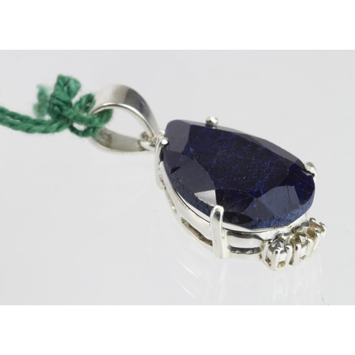 261 - Silver pendant with a 15.9ct pear shaped Blue Sapphire and three tiny diamonds (approx 0.1ct in tota... 