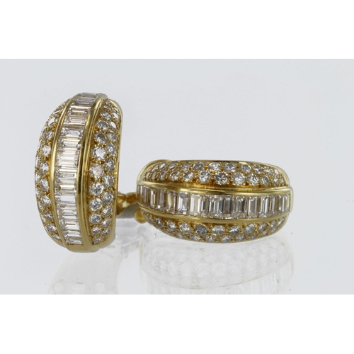 265 - 18ct yellow gold half hoop domed clip on earrings set with a central row of baguette cut diamonds an... 