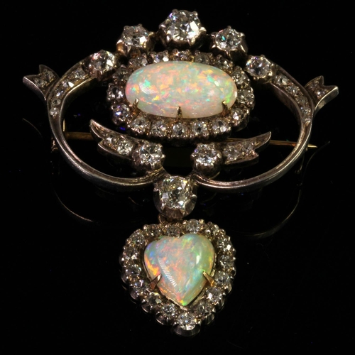 269 - 18ct yellow gold and silver two piece brooch featuring a oval opal cabochon measuring approx. 15mm x... 