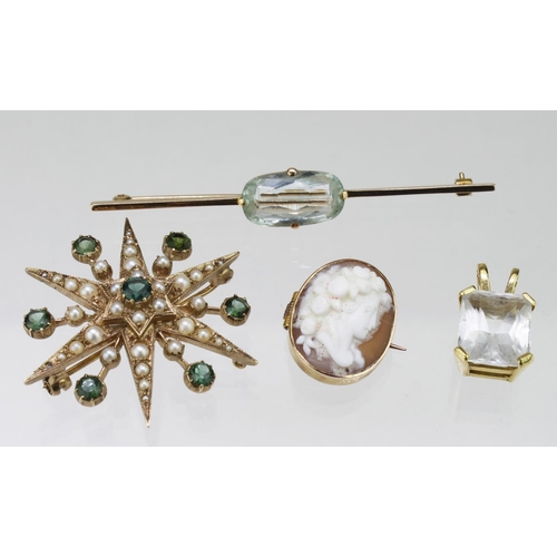 288 - 9ct yellow gold bar brooch set with an oval topaz stone, weight 5.1g. Yellow metal starburst brooch ... 