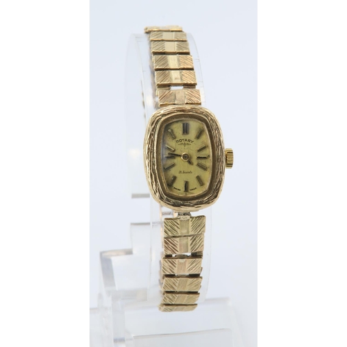 335 - Ladies 9ct cased Rotary wristwatch on a 9ct bracelet. Total weight 15g, watch working when catalogue... 