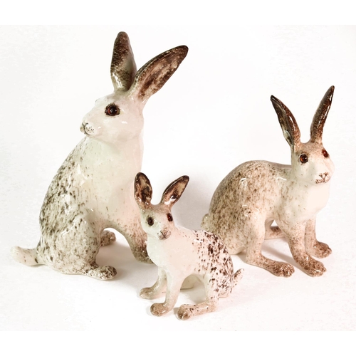 621 - Set of Three Winstanley Hares. Size 6, size 5 and size 2. Hand made and painted with cathedral glass... 