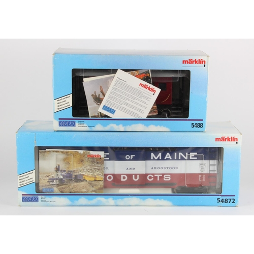 664 - Marklin. Two Marklin Maxi G scale boxed rolling stock, comprising Boxcar (54872) & Caboose (5488)