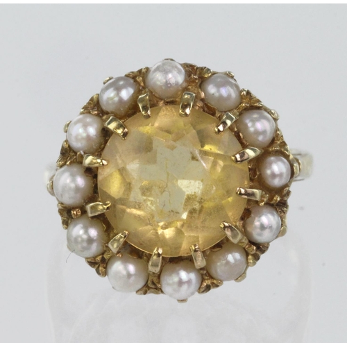 87 - 9ct yellow gold cluster ring set with central round citrine measuring approx. 10mm diameter and surr... 