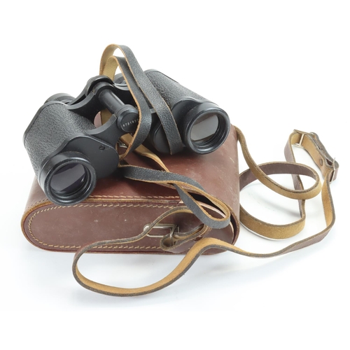 895 - Binoculars- Carl Zeiss Jenoptem binoculars 8x30W in brown leather case.