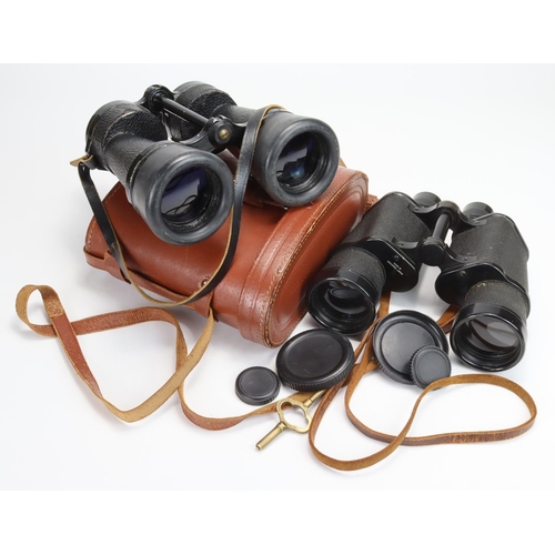 896 - Binoculars. Two pairs of binoculars. Ross London Bino Prism No. 5. MK II x 7 with black leather stra... 