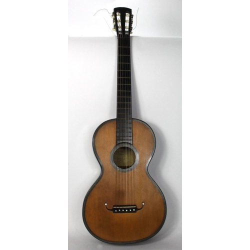 924 - Acoustic Guitar. Late Victorian/ Early 20th century acoustic guitar in wooden coffin shaped carry ca... 