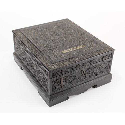 928 - Anglo Indian Box. Carved ebony Anglo-Indian box, profusely carved with floral decoration. The sandal... 