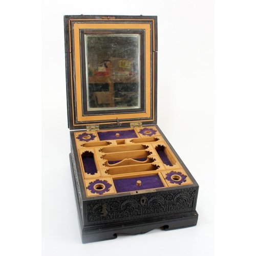 928 - Anglo Indian Box. Carved ebony Anglo-Indian box, profusely carved with floral decoration. The sandal... 