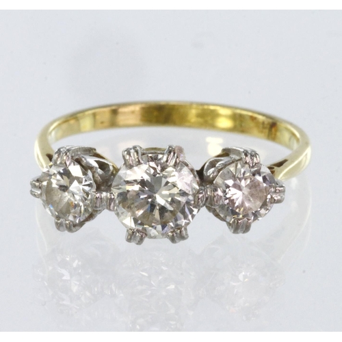 95 - 18ct yellow gold three stone ring consisting of central round brilliant cut diamond calculated as we... 