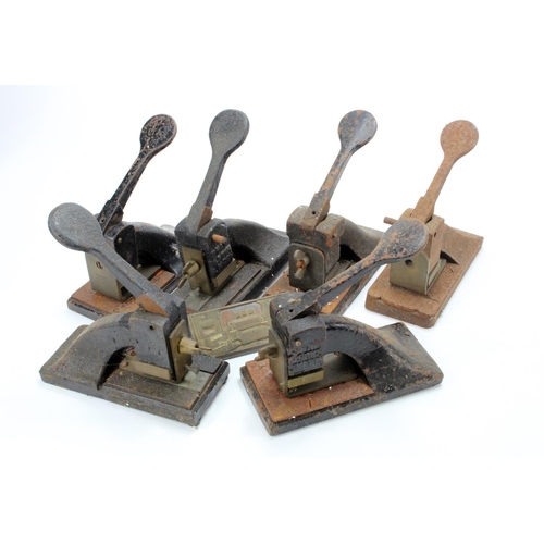 995 - Six cast iron desk stamps, mostly made by Shaw & Sons, London, height 145mm approx., together with a... 