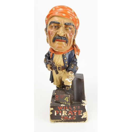 999 - Smoking interest. A Will's pirate shag chalkware model depicting a pirate with oversized head dresse... 