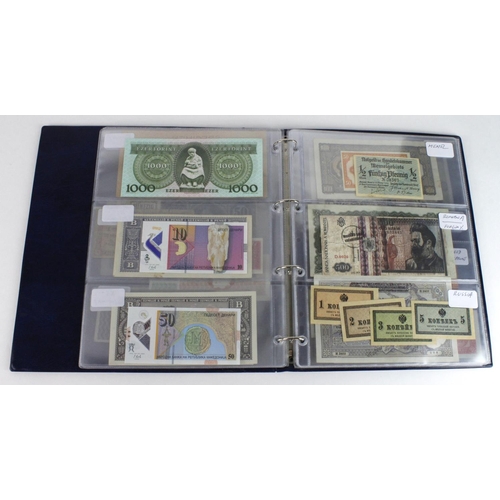 932 - World, Eastern European (55) in banknote album including Bulgaria, Czechoslovakia, Hungary, Memel, Y... 