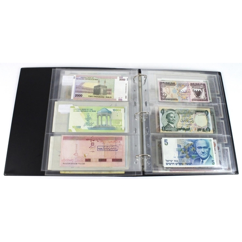 939 - World, Middle East (84) in banknote album comprising Bahrain, Egypt, Iran, Iraq, Israel, Jordan, Kuw... 