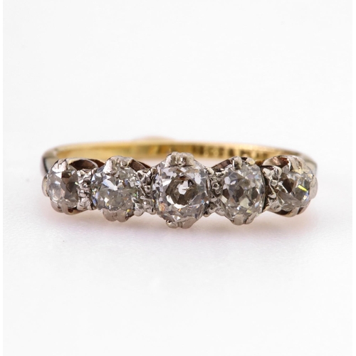 103 - 18ct and platinum diamond ring featuring five graduated round old cut diamonds weighing a total of a... 