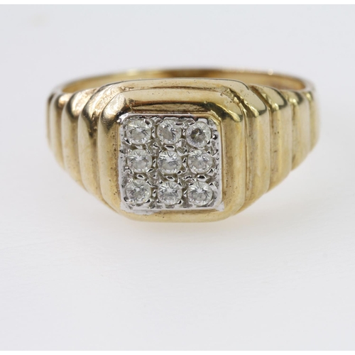 113 - 9ct yellow gold signet style ring set with a cushoin shaped panel of pave set cz and ribbed shoulder... 