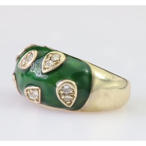 116 - 9ct yellow gold bombe shaped band ring featuring green emamel and randomly spaced pear shaped statio... 