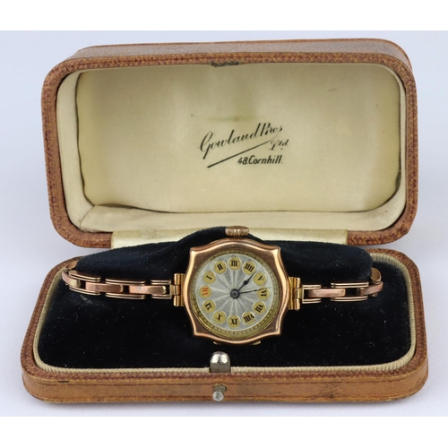 456 - Boxed ladies 9ct cased wristwatch with import marks for glasgow 1921. On an expandable 9ct bracelet,... 