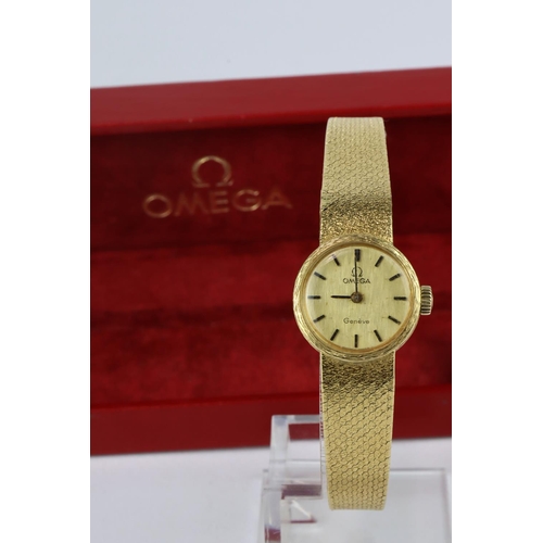 463 - Ladies 18ct cased Omega wristwatch circa 1971, on an 18ct integral bracelet, in its original box. Wa... 