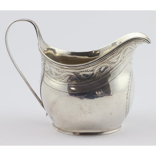 586 - George III silver bright-cut engraved cream jug in the shape of a helmet. Maker rubbed but could be ... 