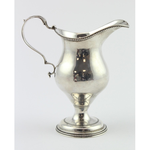 588 - George IV silver milk/cream jug of helmet form. Hallmarked London 1821 by Robert Hennell?. Approx 4o... 