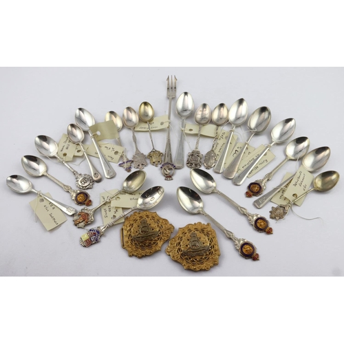 607 - Military interest. A collection of approximately twenty silver & silver plated souvenir teaspoons (m... 